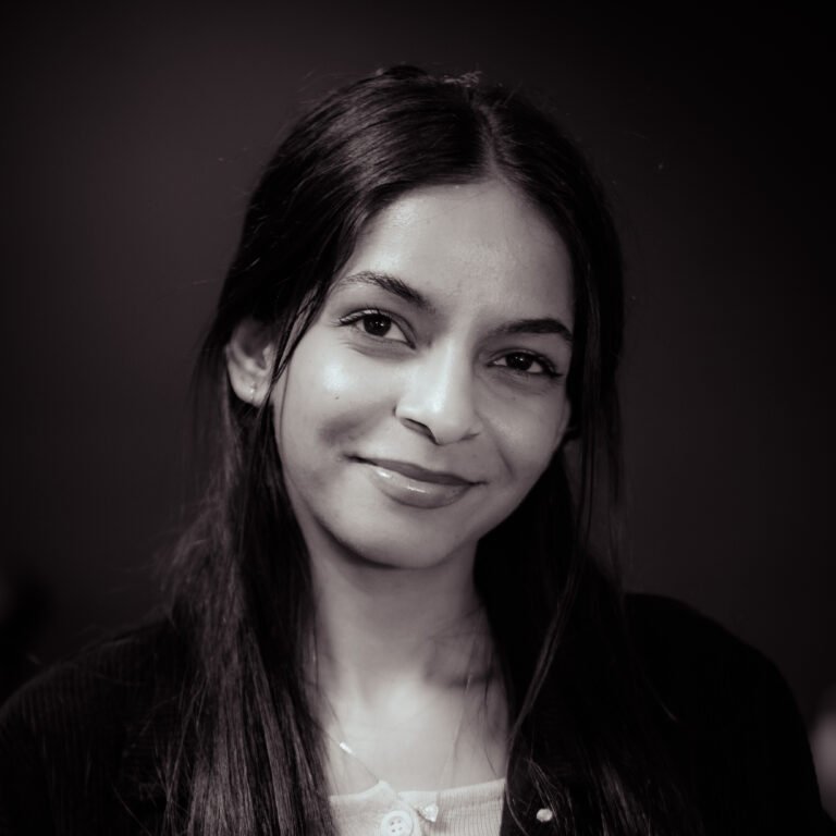 Professional portrait of Prerna, body piercer at Tattoo Lab Studios Halifax, offering safe and precise ear and facial piercings.